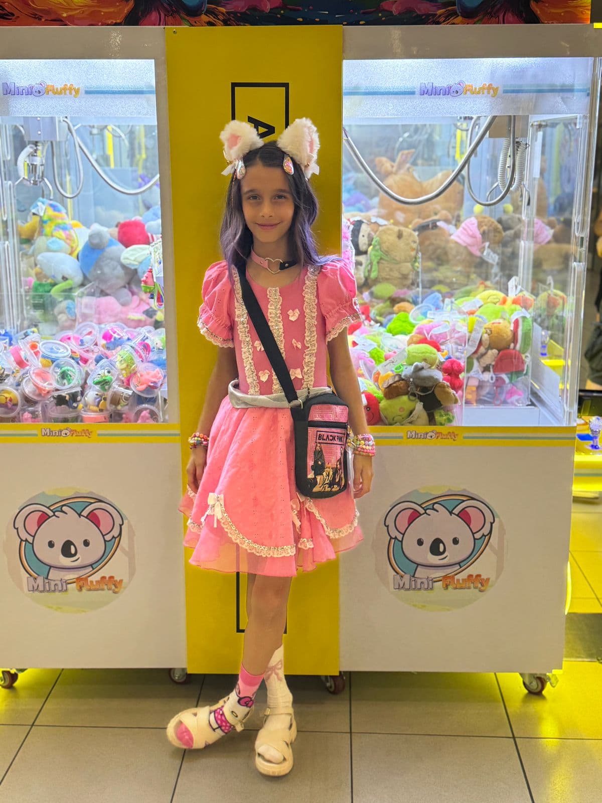 Luna em vestido rosa com orelhinhas